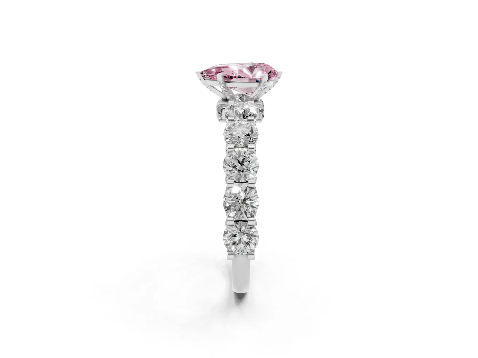 Fancy Pink Pear Cut Diamond Side Stone Engagement Ring with Four-Prong Setting Platinum
