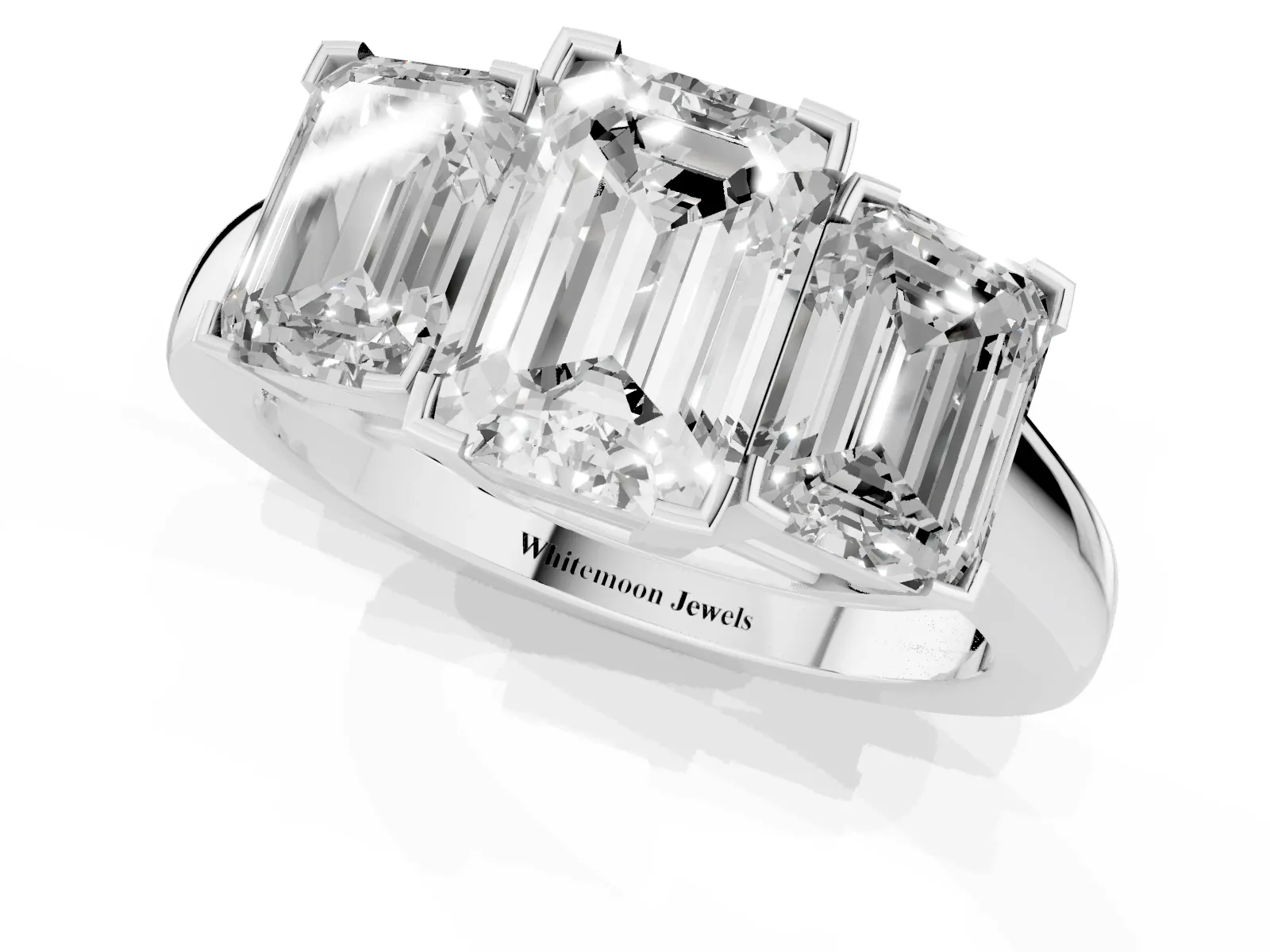 Three-Stone Emerald Cut Cut Diamond Ring with Channel Set Band and Four-Prong Setting Platinum